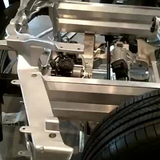 Tesla-S..-Battery-pack-and-drivetrain-close-up-walk-around-view